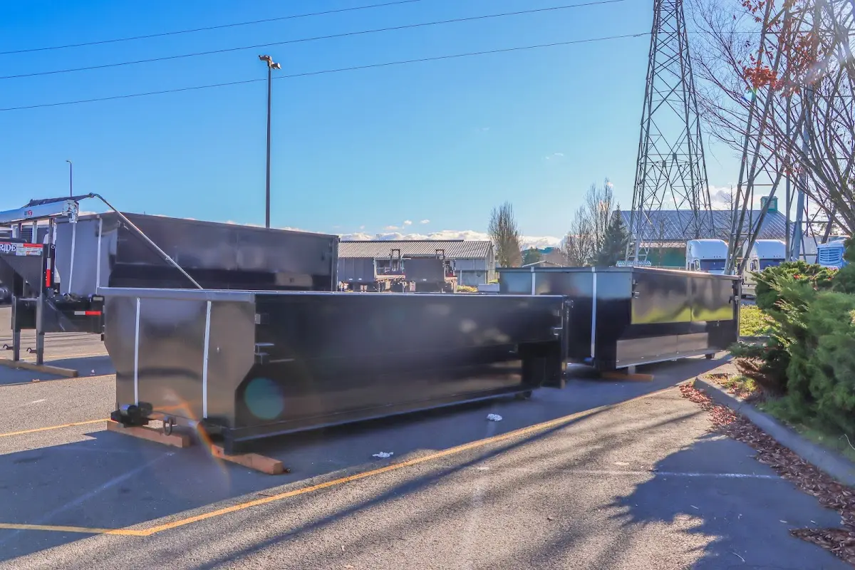 Roll-off dumpster ready for waste disposal at job site for 6 Yard Dumpster Rental in Burlington